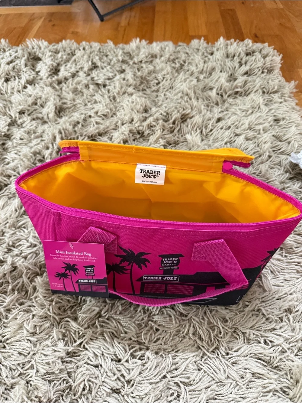 Trader Joe’s Bright Pink and Yellow Mini insulated lunch cooler.